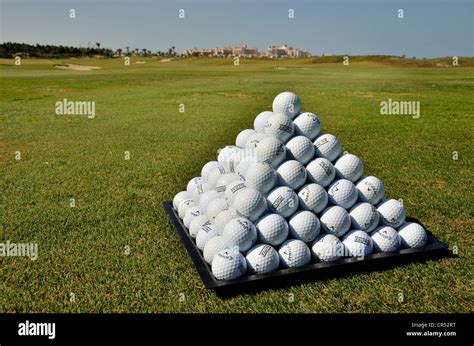 Pyramidal stacked golf balls in the Saadiyat Beach Golf Club on ...