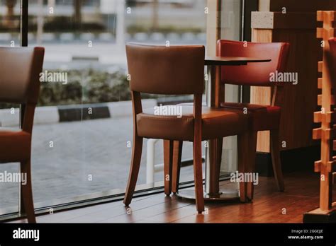 Empty Outdoor Restaurant Café With Street View Table And Chairs For Two