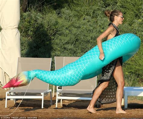 Heidi Klum Flaunts Her Bikini Body During Sun Soaked Day In Sardinia