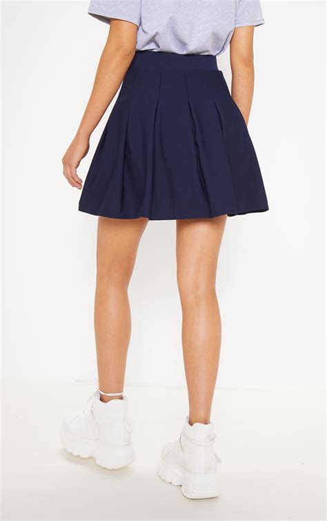 Jupe plissée style tennis bleu marine Jupes PrettyLittleThing FR