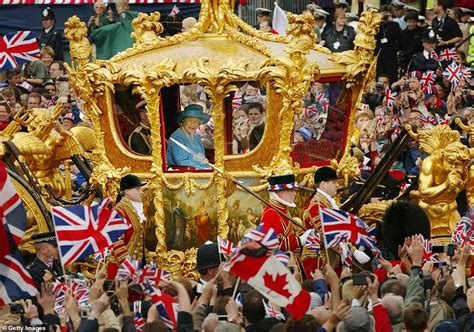 Queens Famous Golden Coach Carriage Is Seen On Streets Of London For