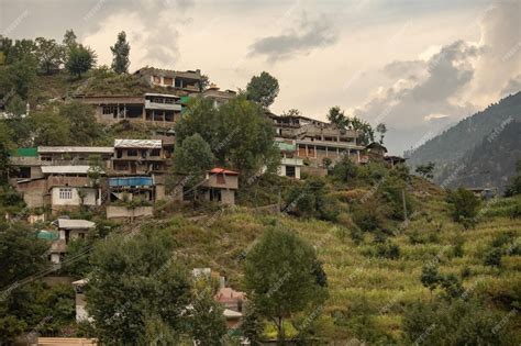 Premium Photo | Traditional Pakistani village houses on the hill in ...