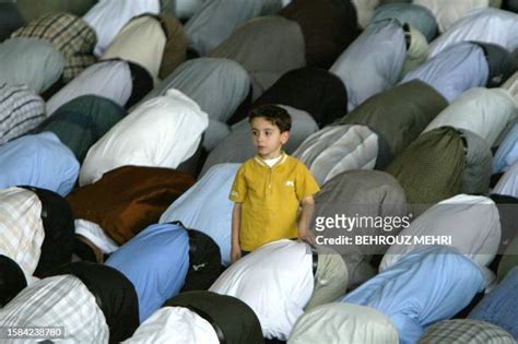 617 A Boy Kneeling And Praying Stock Photos High Res Pictures And