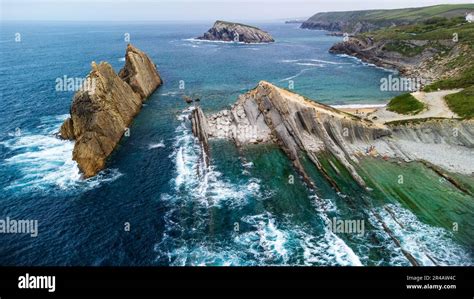 Stunning Coastal Formation Featuring Towering Rock Pillars Rising From