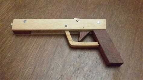 Rubber band gun Band Fun, Cool Bands, Deer Antler Ideas, Rubber Band Gun, Woodworking Workshop ...