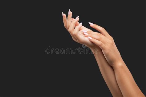 Close Up Of The Girl`s Hands The Girl Applies A Cream For Moisturizing