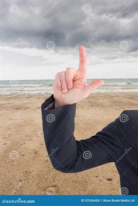 Arm Pointing Up at Sky on Beach Stock Photo - Image of lens, shore ...