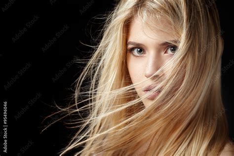 Portrait Of Beautiful Blonde Woman With Flying Hair Stock Photo Adobe Stock