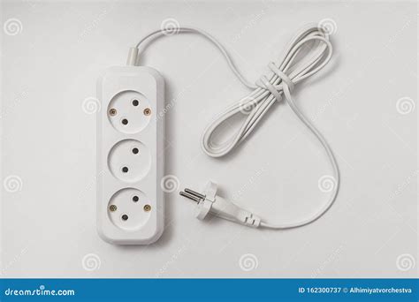 Extension Cord For Three Sockets With A Long Coiled Cord Royalty-Free ...