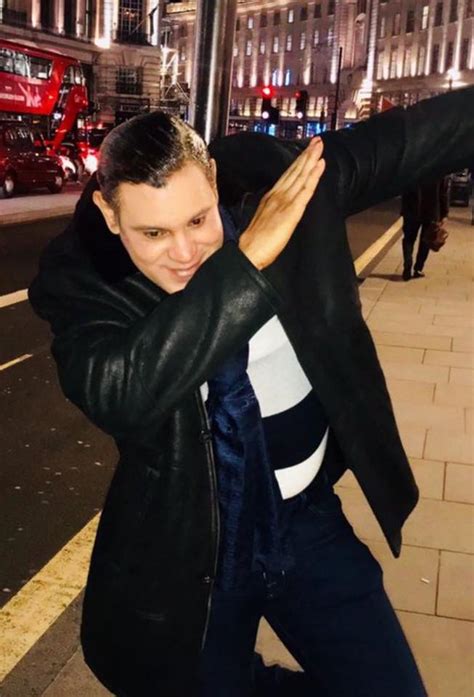 This picture of Sammy Sosa dabbing looks like someone wearing a mask ...