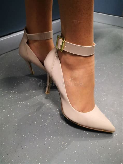 Closeup Of Female Feet Wearing Nude Catwalk Pointed Toe Ankle Strap Pumps Stock Photo Image Of