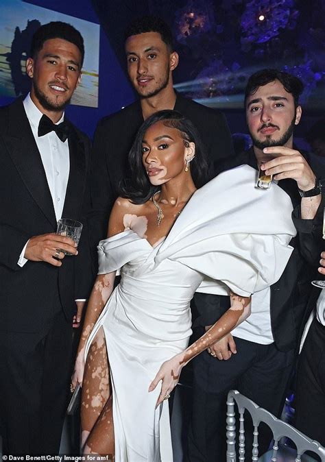 Winnie Harlow cosies up to boyfriend Kyle Kuzma at amfAR in 2024