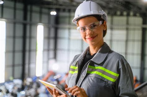 Female Engineer Worker Working With Robotic Machine Automation Stock