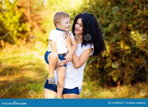 Portrait Of Happy Mother And Son Smiling Stock Image Image Of Love