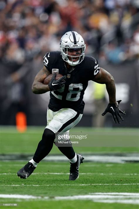 Josh Jacobs Of The Las Vegas Raiders Runs With The Ball During An Nfl