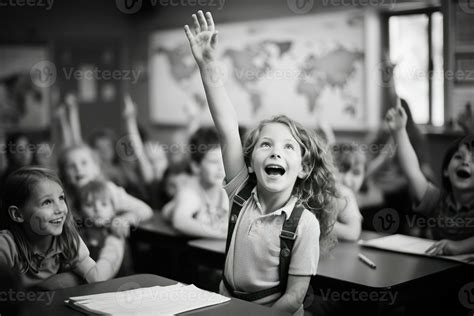 Elementary school children raising hands in class. Black and white ...