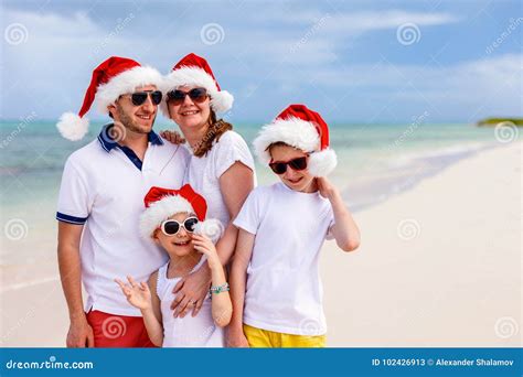 Family at Beach on Christmas Stock Image - Image of daughter, season ...