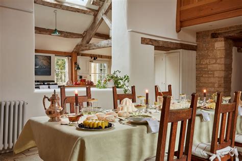 A Cotswold house has been revived by its creative owners, who have complemented its blend of old ...