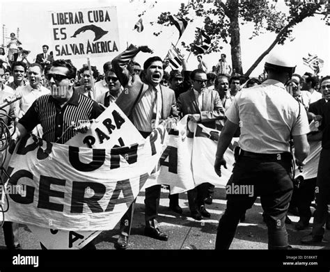 Cuban refugees battle police today after attempting to storm the Pan ...