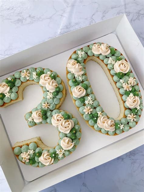 Sage Green And Nude Number Cake With Floral Buttercream Decoration