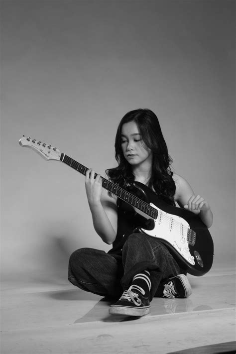 Woman With Electric Guitar