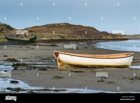 Old Wrecked Fishing Boat On The Donegal Coast In Ireland Stock Photo