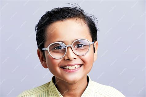 Premium Photo Indian School Boy In Uniform And Giving Expression