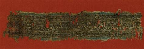 Islamic, Decorative Band from a Tiraz Textile Inscribed "Help from God ...