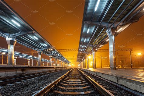 Railway station at night railroad featuring train, railway, and ...