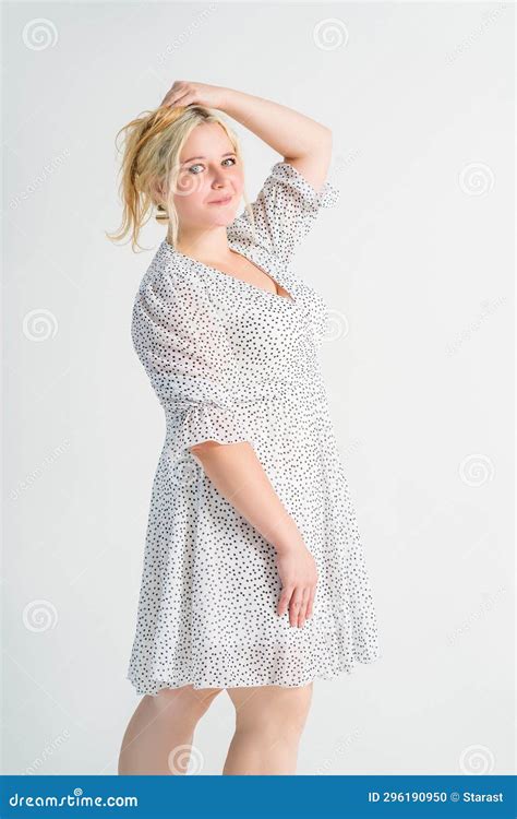 Happy Blonde Plus Size Model In Polka Dot Dress Fat Woman On Gray