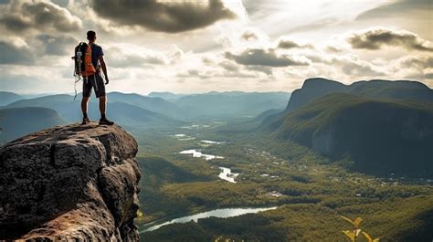 Premium Ai Image Climber Standing On The Mountaingenerative Ai