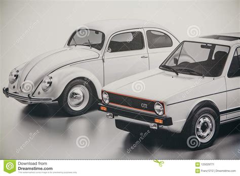 A Photo Of An Image Of Old Fashioned Cars Volkswagen Beetle And Jetta