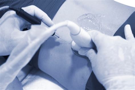 Premium Photo Cropped Hands Of Doctor Examining Female Patient In