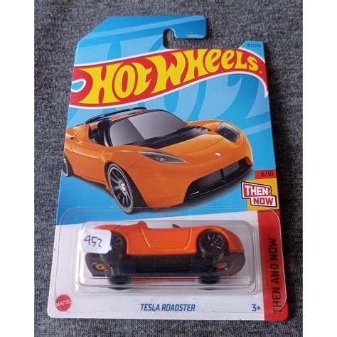 Jual Hot Wheels Tesla Roadster Then And Now Orange Shopee Indonesia