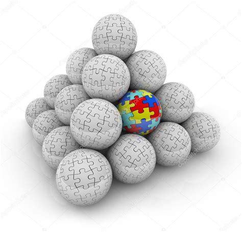 Pyramid Of Balls With Puzzle Pieces On Them Stock Photo Iqoncept