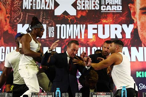 KSI vs Tommy Fury press conference features flipped tables and thrown ...