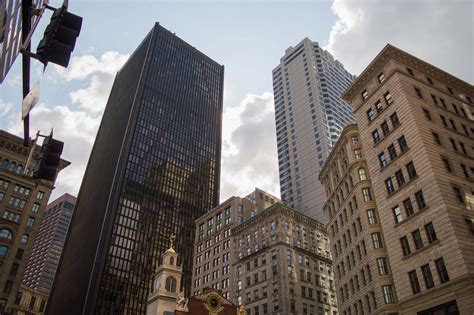 Urban City With High Rise Buildings Under White Skies Downtown Image