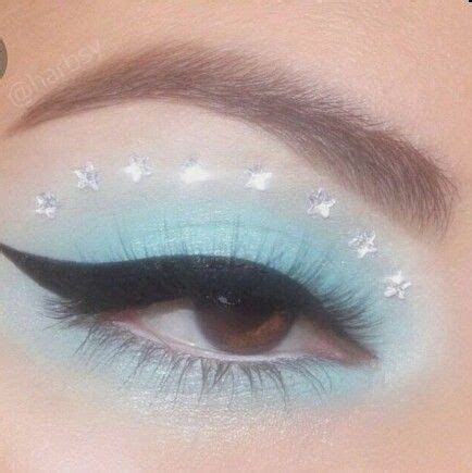 Light blue makeup | Rhinestone makeup, Eye makeup, Blue makeup