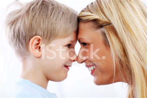 Mother And Son Are Touching Their Heads Stock Photo Royalty Free