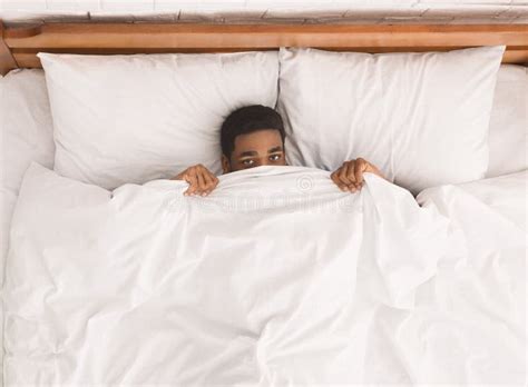 Man Hiding In Bed Under Sheets Stock Image Image Of Bedtime Awake