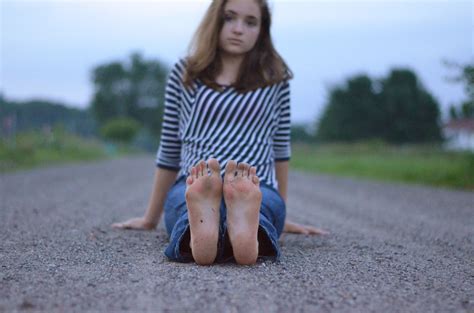 Tween Girl Sitting Barefoot