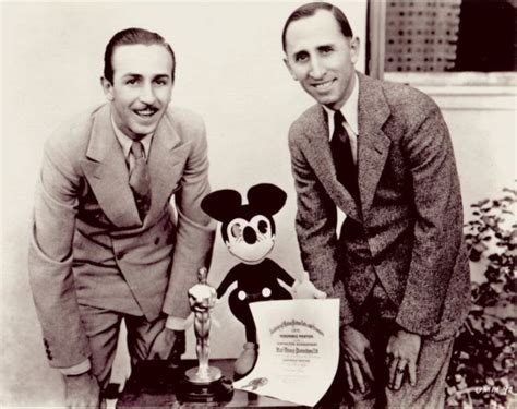 Walt Disney and Roy Disney with Mickey mouse and the first of the 26 ...