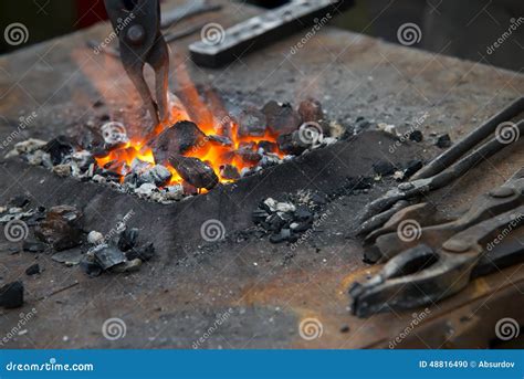 A Small Anvil, Forge and Blacksmith Tools. Stock Photo - Image of ...