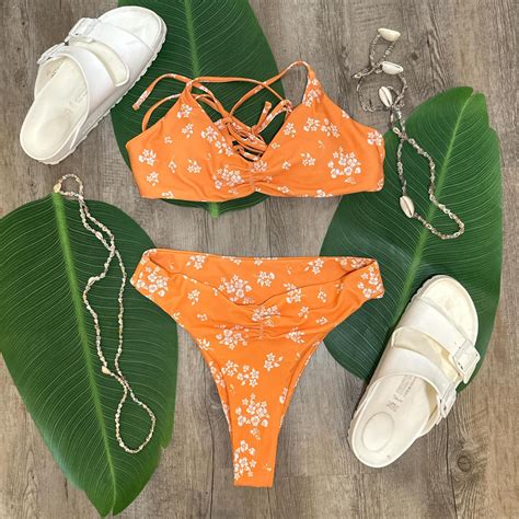 Orange Floral Bikini Set With A High Leg And Lace Up Depop