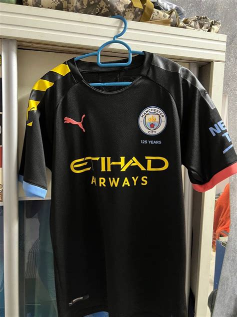 Manchester city 2019/2022 away kit, Men's Fashion, Activewear on Carousell