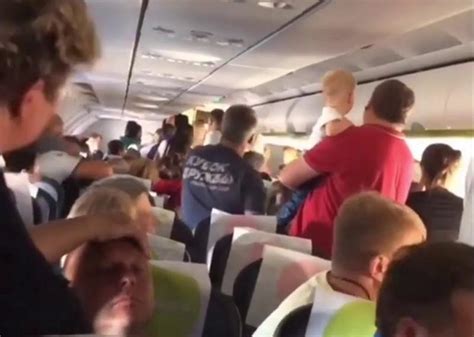 Air Rage S7 Passengers Tie Up Drunk Man On Plane Flight