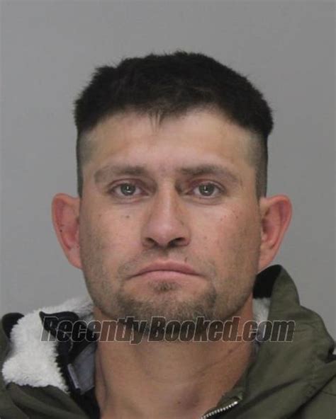 Recent Booking Mugshot For Carlos Munoz In Dallas County Texas