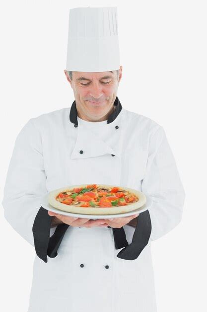 Premium Photo Happy Chef Holding Pizza