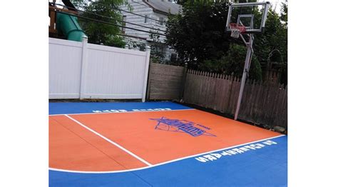 Custom Basketball And Tennis Court Logos And Graphics Installed On Long