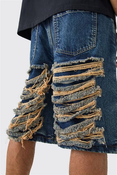 Relaxed Rigid Extreme Ripped Denim Jorts In Antique Blue Boohoo Uk